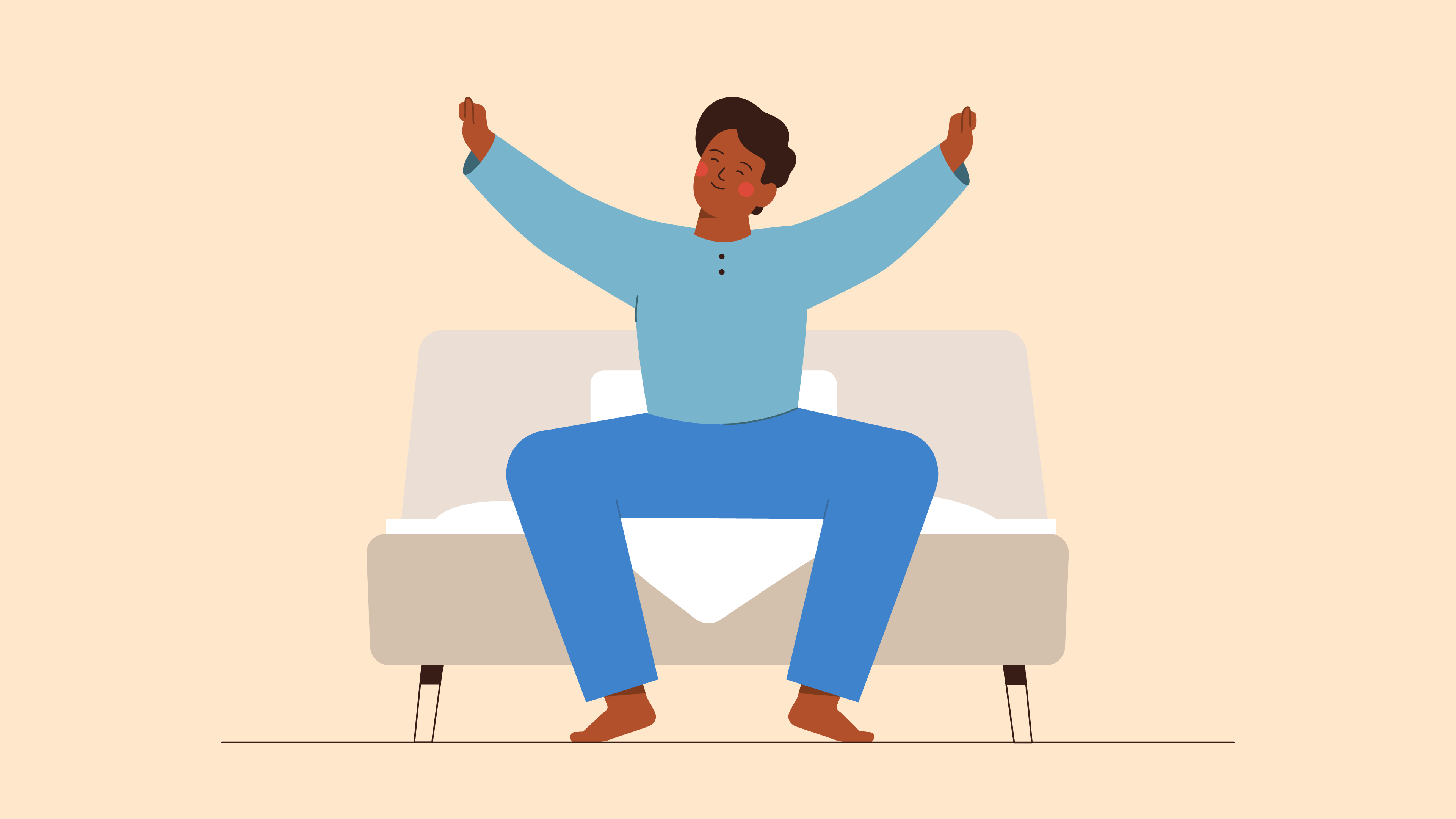 A man stretching and waking up from bed