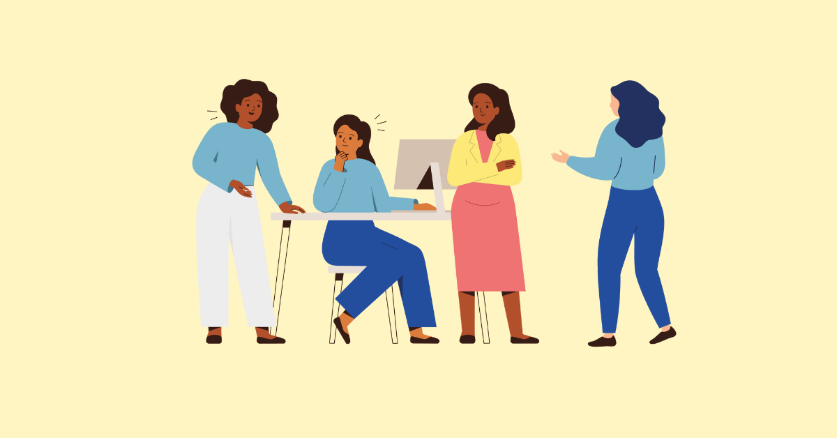An illustration of colleagues chatting at a desk 