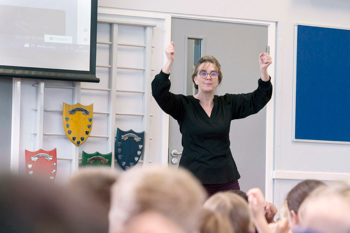 Headteacher in assembly 