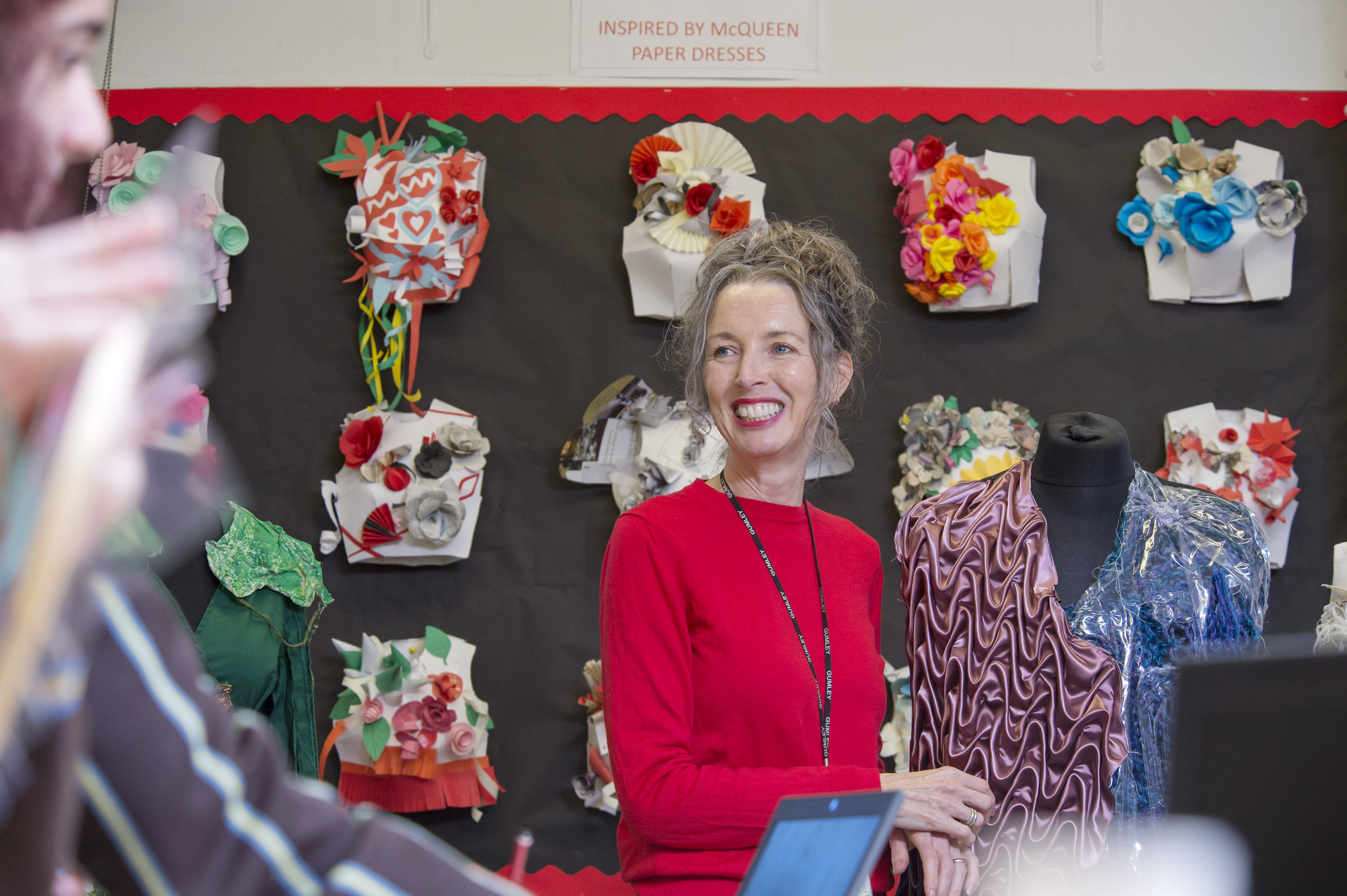 Textiles teacher smiling 